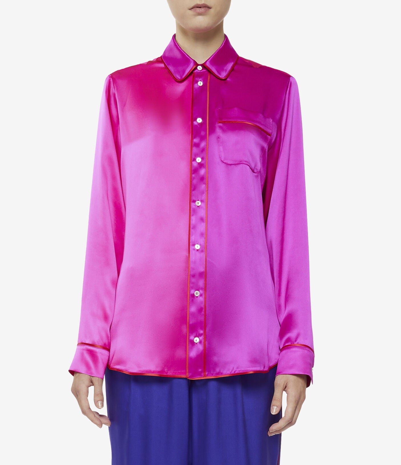 Close-up of the Adana Shirt's soft silk fabric, highlighting its smooth texture and vibrant fuchsia hue.