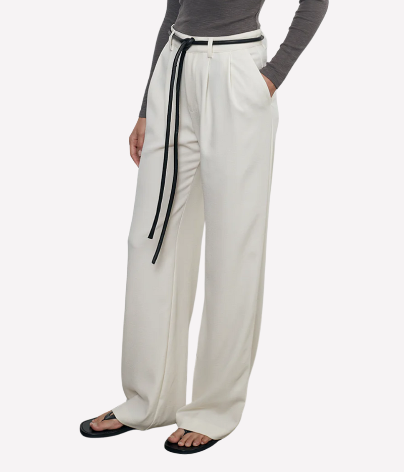 Mid-rise crepe trousers with a wide-leg silhouette, soft pleats, and functional pockets for a polished yet effortless look.