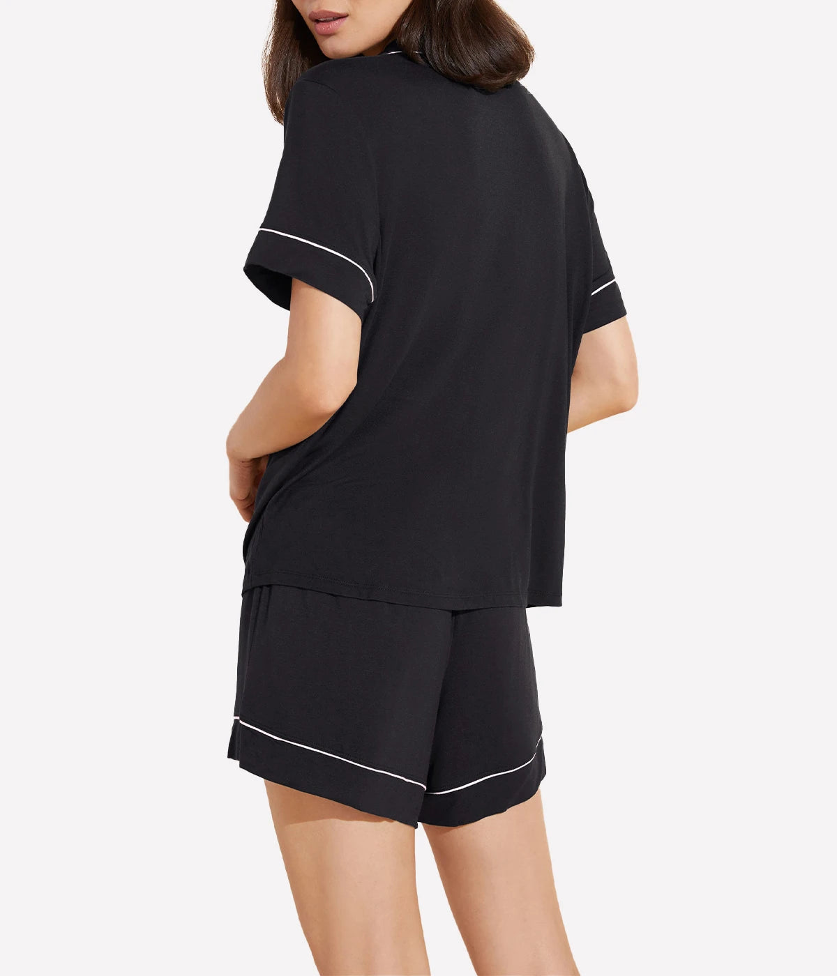 ALT Text: Relaxed button-down top and boyfriend-fit shorts set with tortoise-colored buttons and contrast piping for casual sophistication.