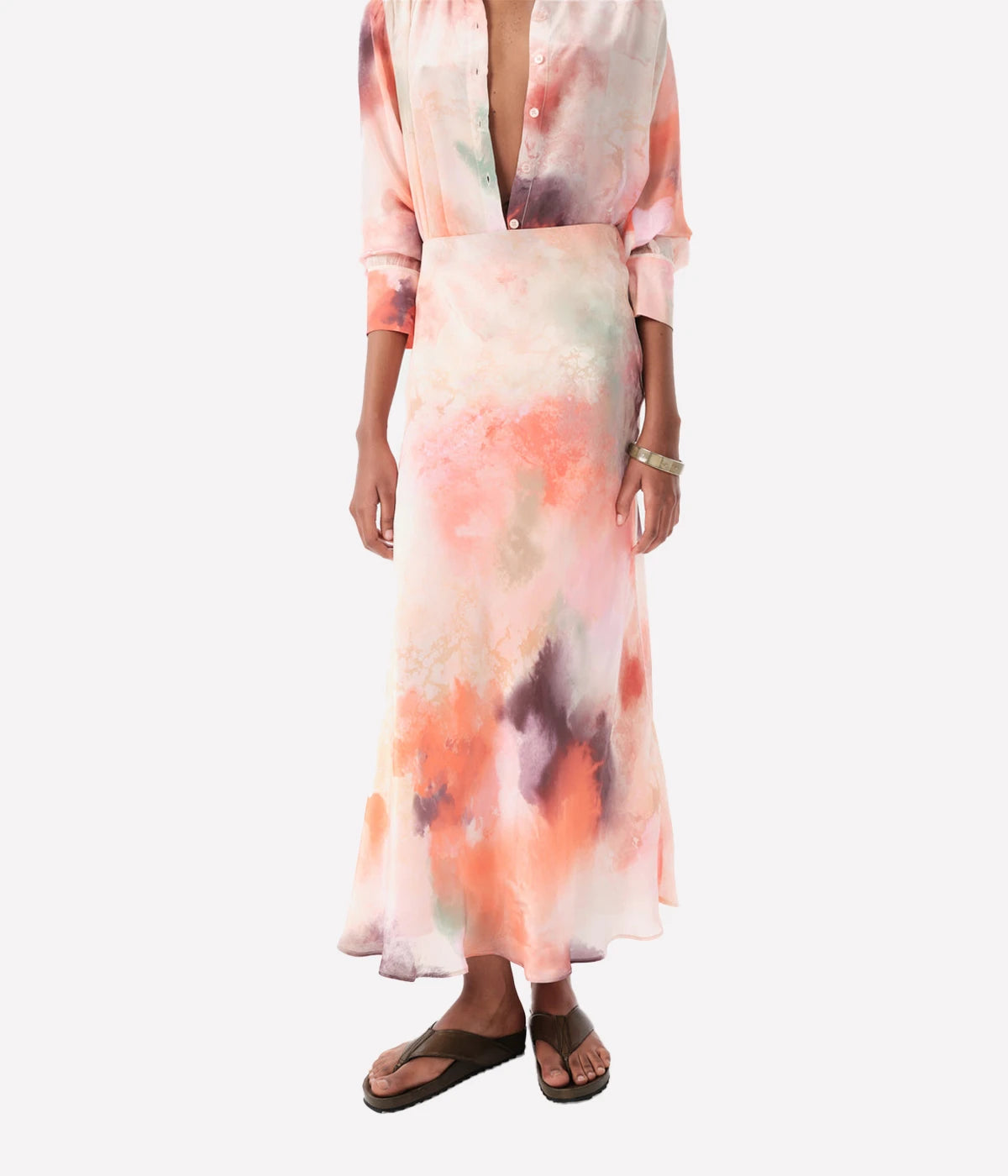 ALT Text: Jufre Ellen Long Skirt in Wild Rose, featuring a soft misty print in hues of pink and lavender, crafted from 100% Viscose Natural Crepe.