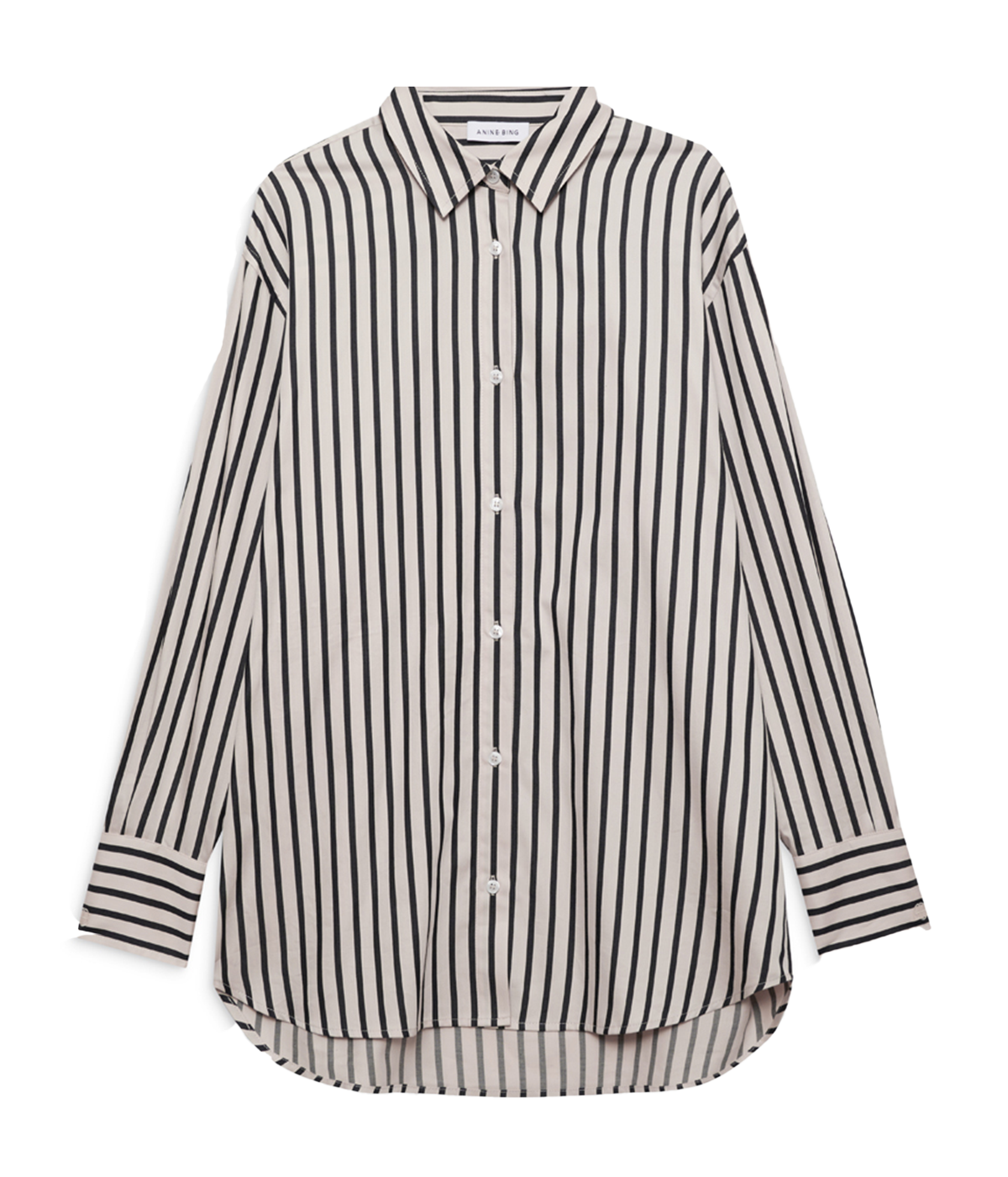 alt text: A lightweight button-up shirt with tan and white stripes, featuring a relaxed silhouette and slightly longer hemline. Styled tucked into tailored trousers for a polished yet effortless look.