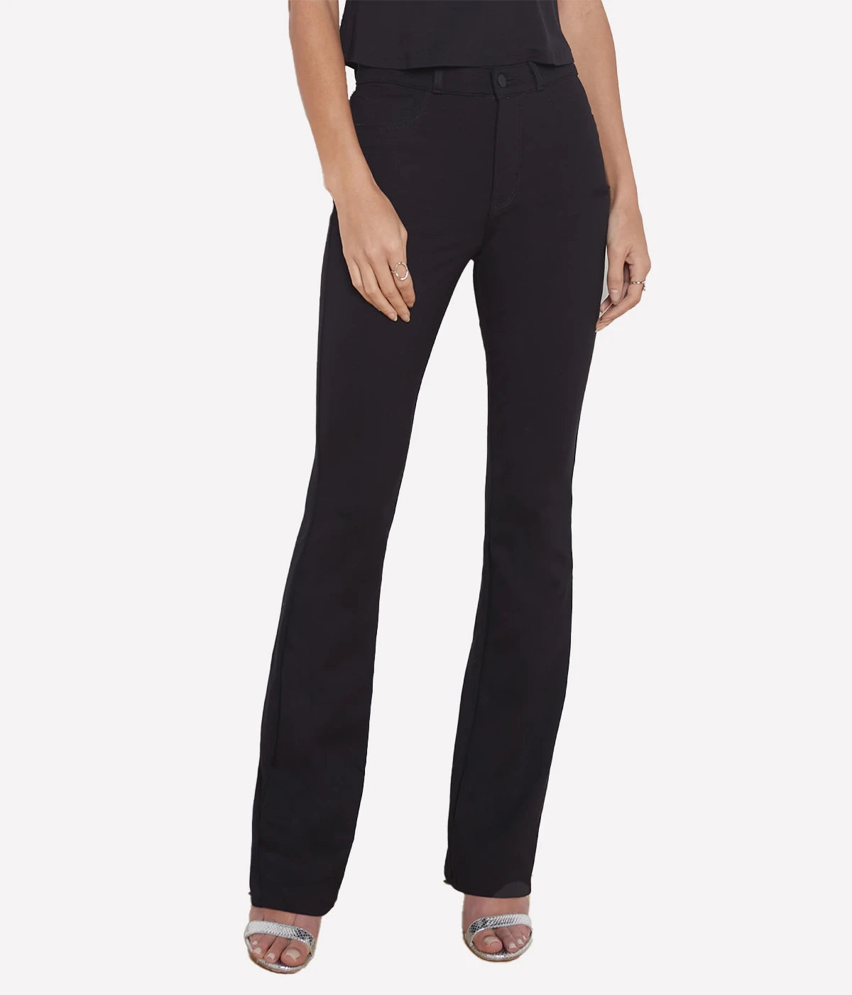 High-rise black bootcut pants with a sleek fit and tailored details, perfect for versatile styling.