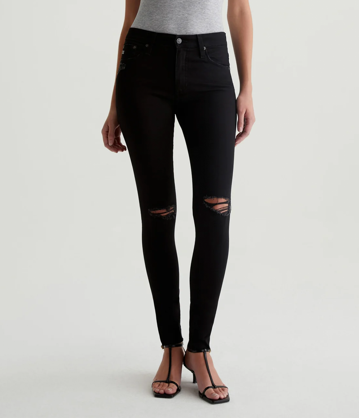 The Farrah Skinny Ankle Jean in 1 Year Midnight Black Destructed