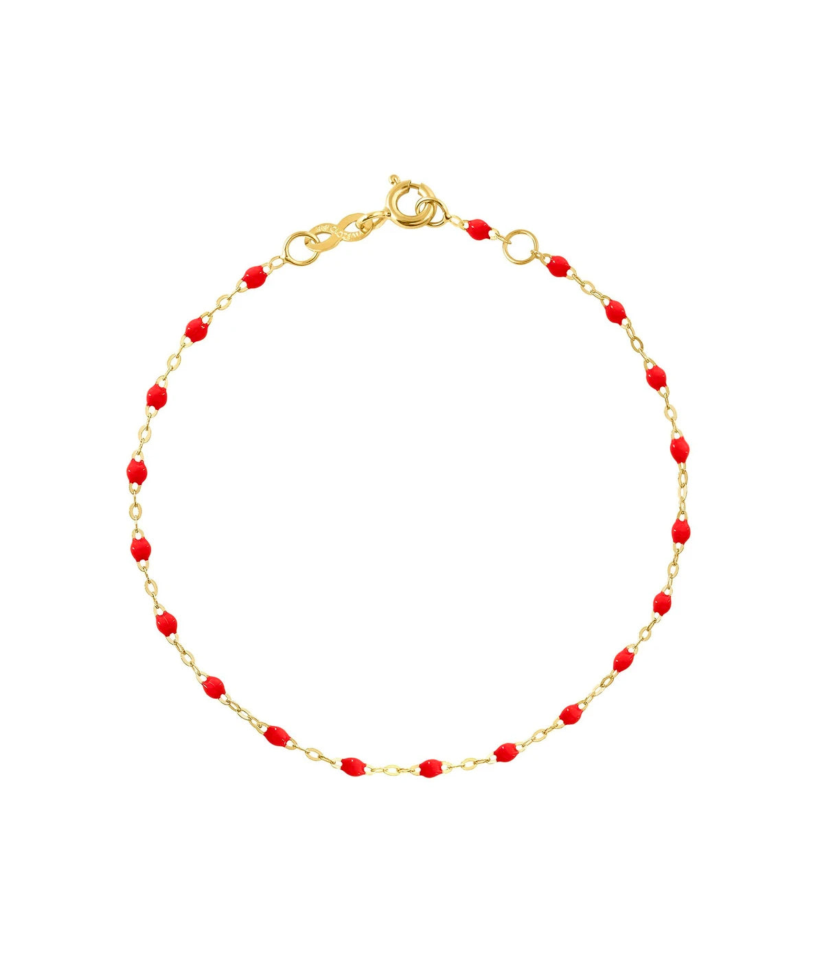 Delicate gold bracelet with colourful resin jewels, styled elegantly for a minimalist yet chic look.